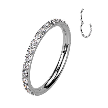 A close-up image of a silver-colored crystal pave clicker earring, showing the detail of the crystals on the hoop.