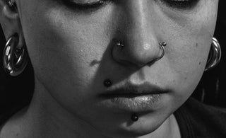 person wearing hoop earrings