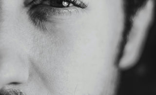 mans face in grayscale
