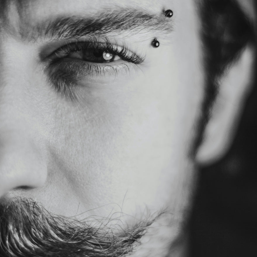 mans face in grayscale