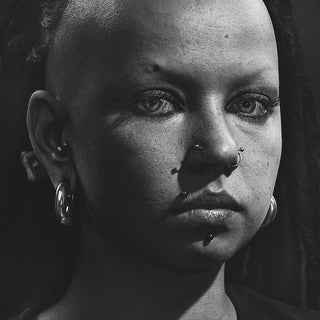grayscale photo of womans face