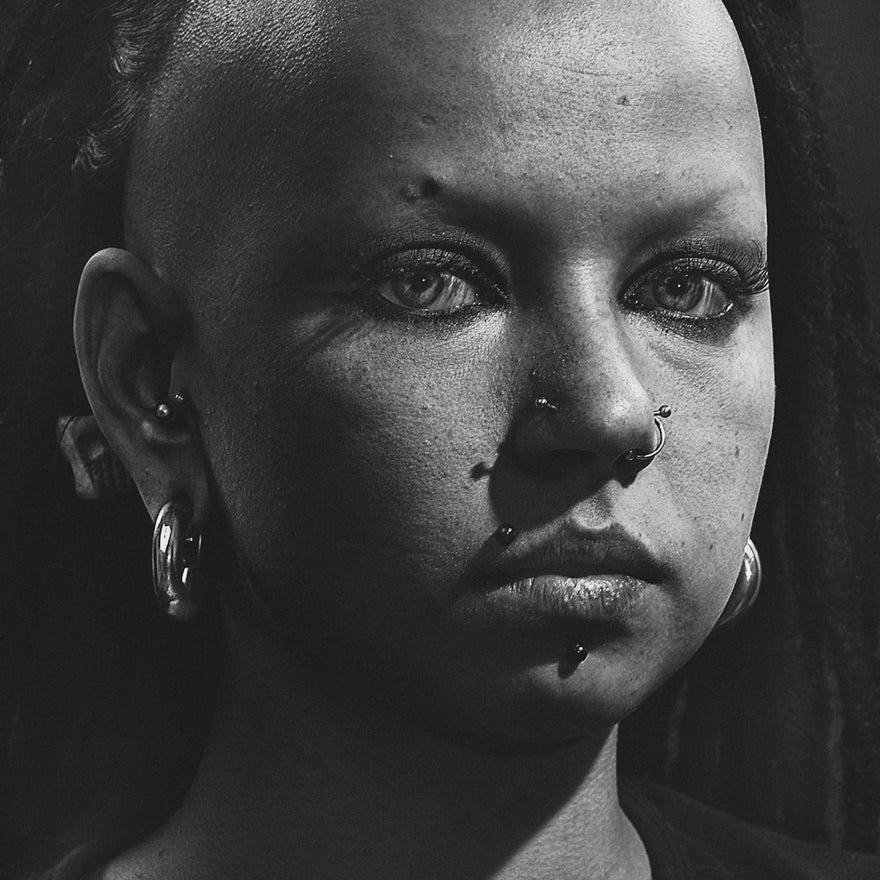 grayscale photo of womans face