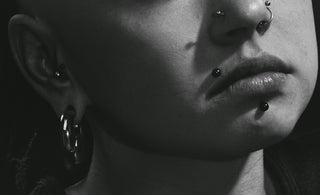 grayscale photo of womans face