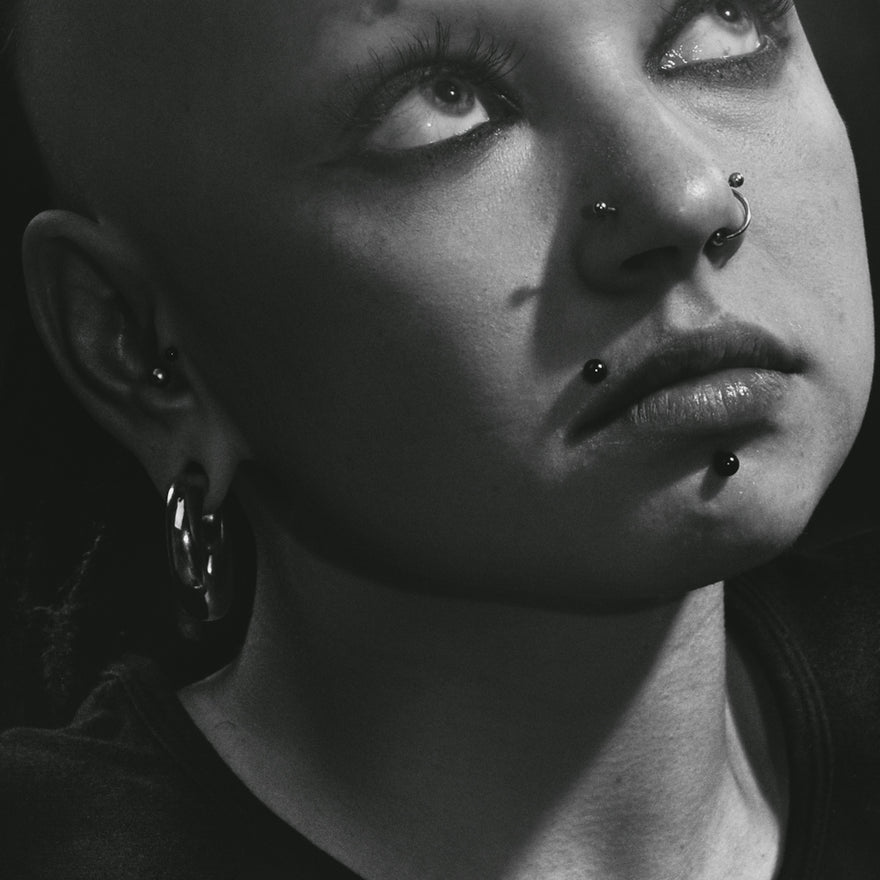 grayscale photo of womans face