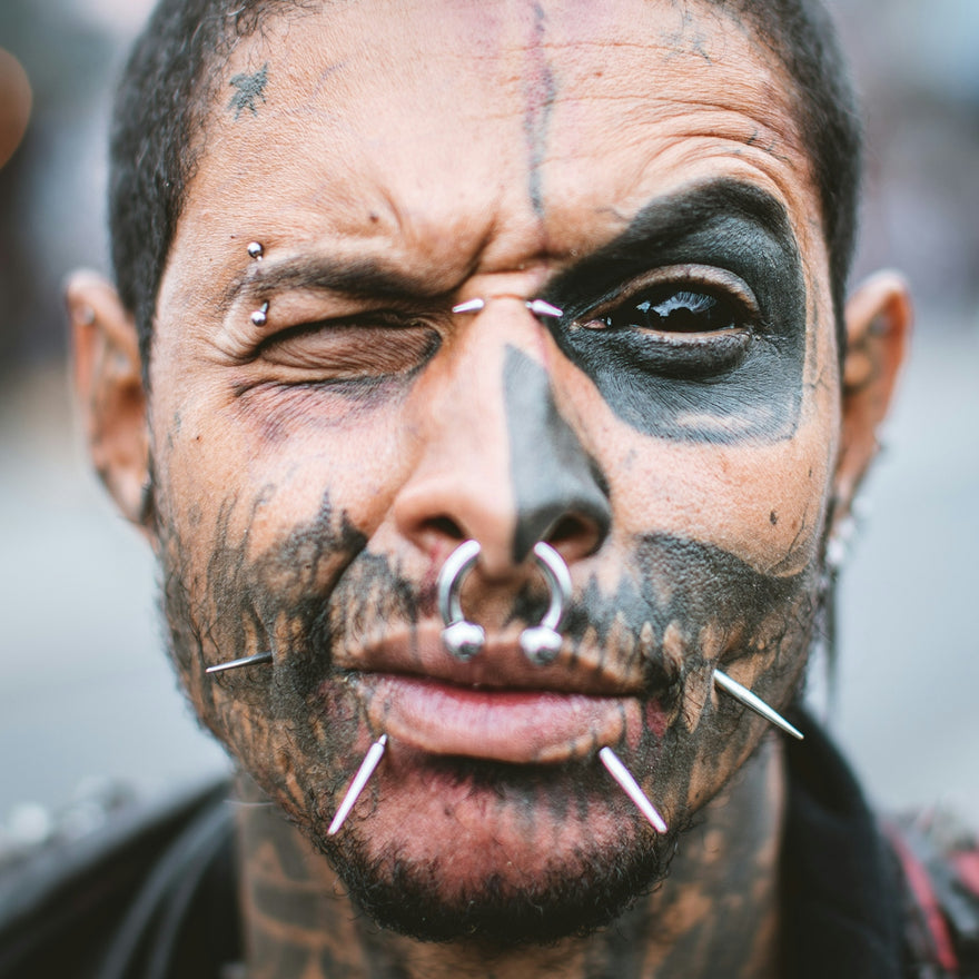 man with silver nose piercing