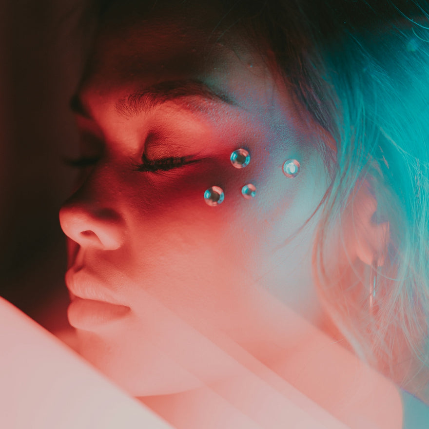 a woman with piercings on her face
