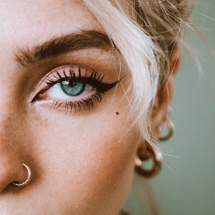 a person with a piercing