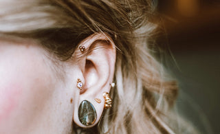a person with a piercing