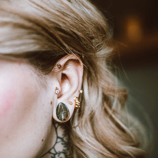 a person with a piercing