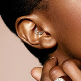 The Amara Gold Titanium Hinged Clicker Earring