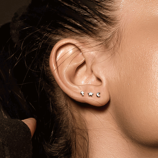 Black Titanium Cross Body Jewellery. Labret, Monroe, Tragus and Cartilage Earrings.